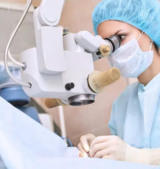 A female surgeon performing surgery.